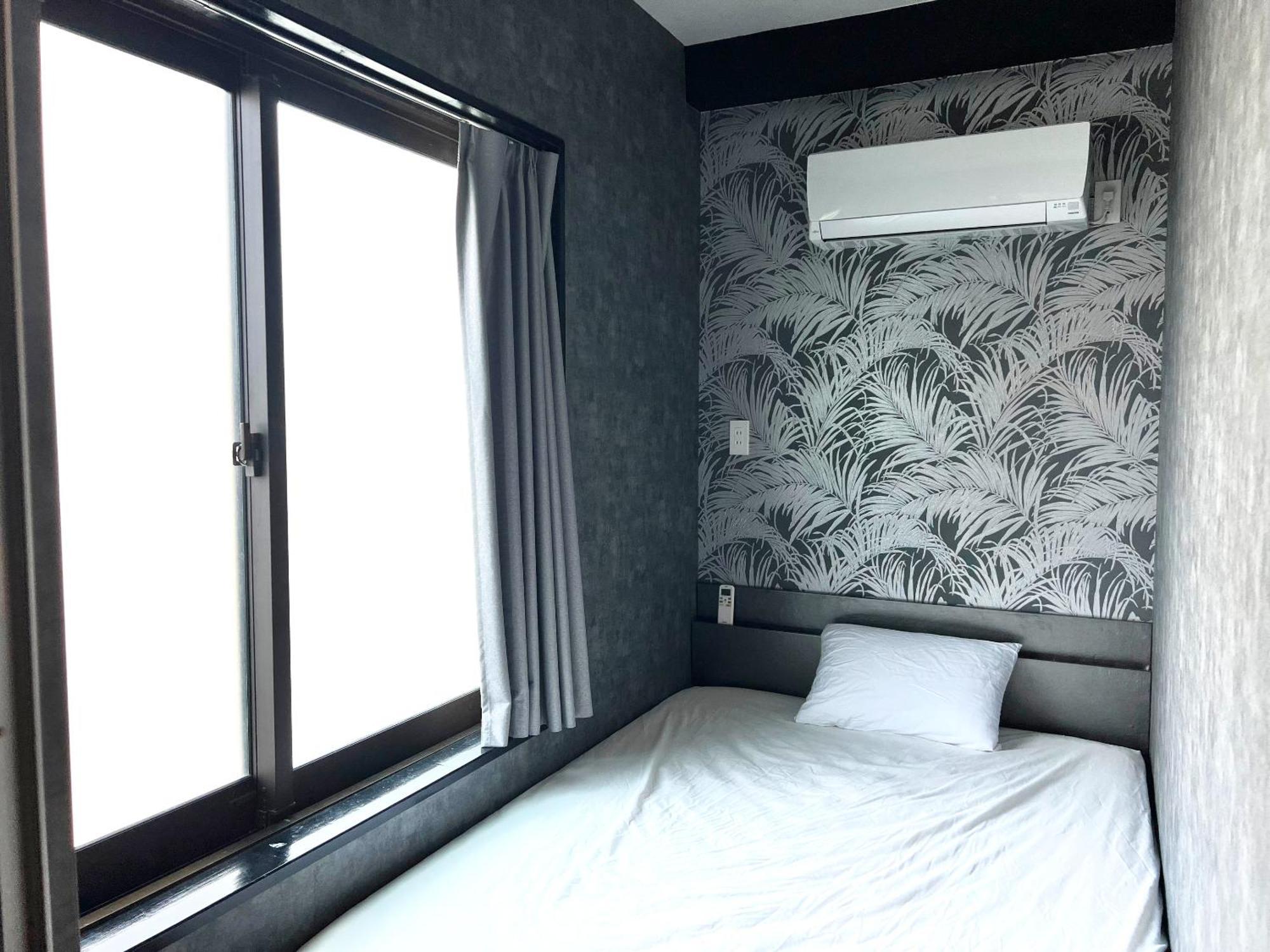 ゲストハウス Joooy Hotel 奄美 Amami Exterior photo